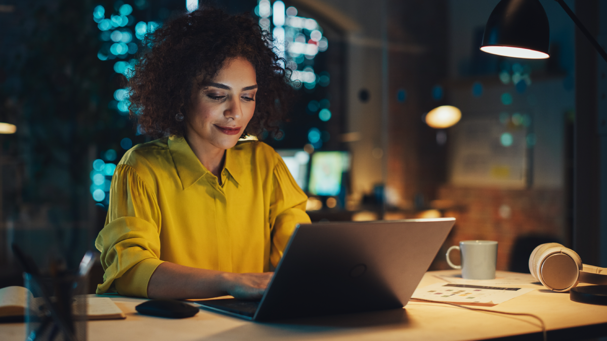 Woman working late on a laptop