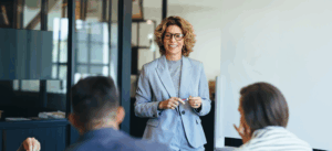 A Business Woman Leads A Meeting With Her Team In Office