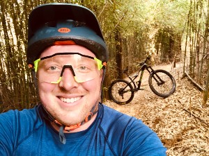 SE alumni Luke Boyd snaps photo of bike on trail
